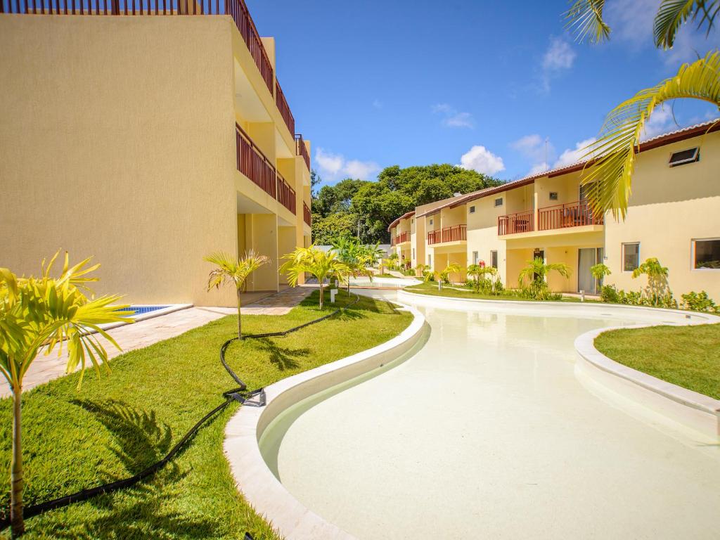  Flat completo e bem localizado no Solar Água Pipa por Carpediem