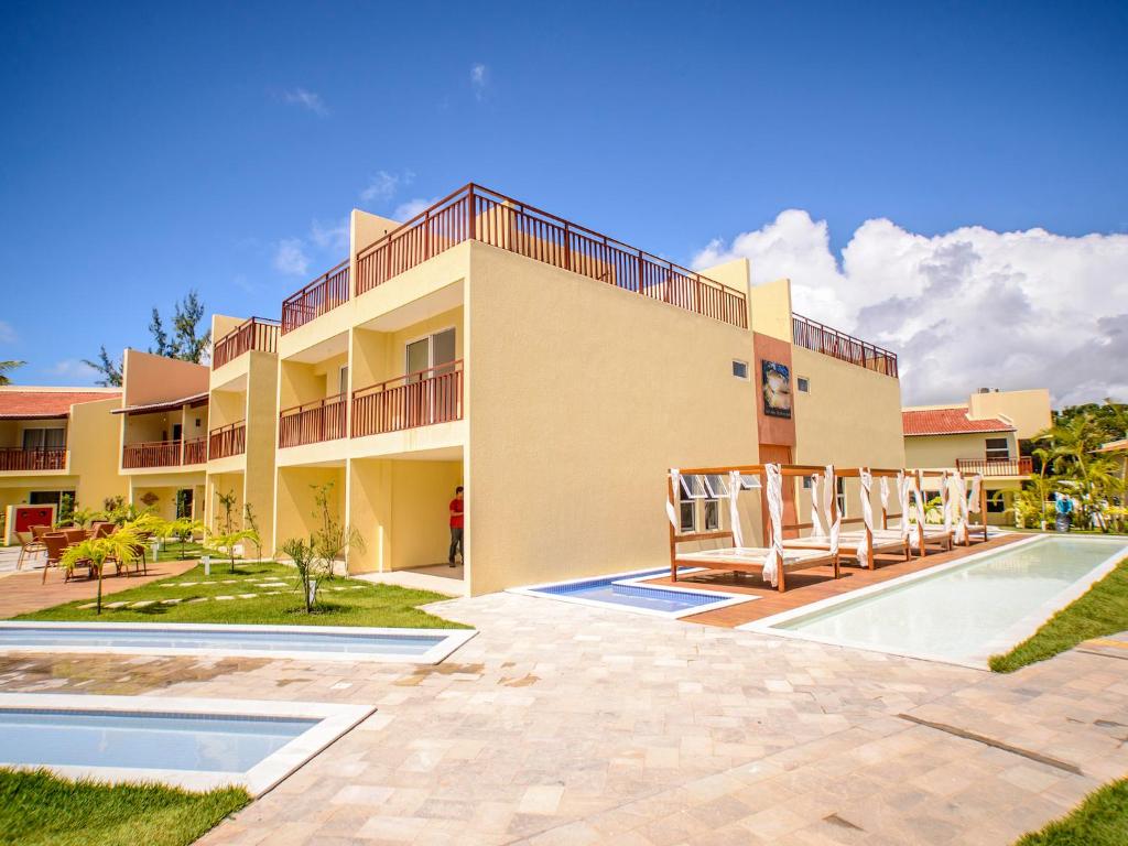  Flat completo e bem localizado no Solar Água Pipa por Carpediem