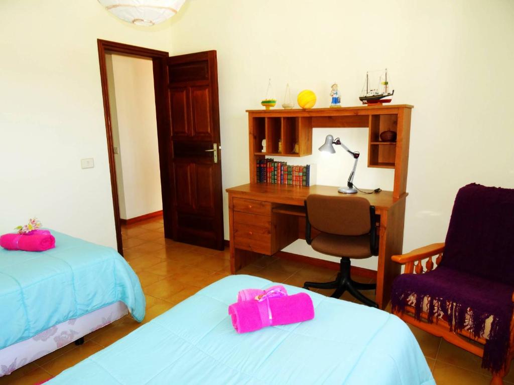 Postel nebo postele na pokoji v ubytování Casita Joli