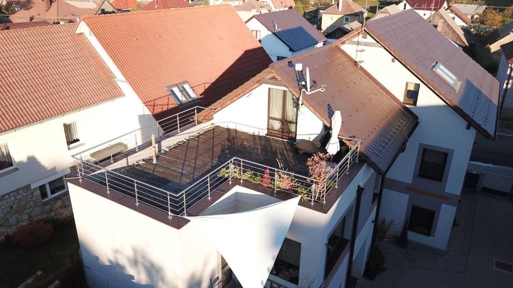 an overhead view of a house with a balcony at Apartmany Adavy in Liptovský Mikuláš