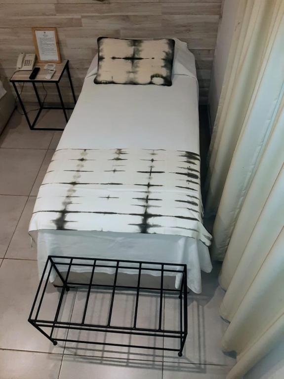 Postel nebo postele na pokoji v ubytování Hotel Tunuyan