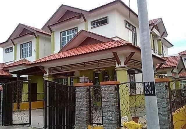 a house with a fence in front of it at Islamic Homestay Sungai Petani in Sungai Petani