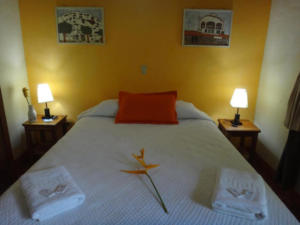 Hotel Casa Barcelona tesisinde bir odada yatak veya yataklar