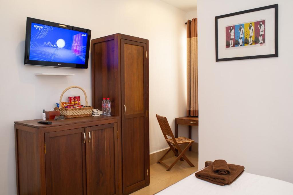 TV a/nebo společenská místnost v ubytování Villa Grange