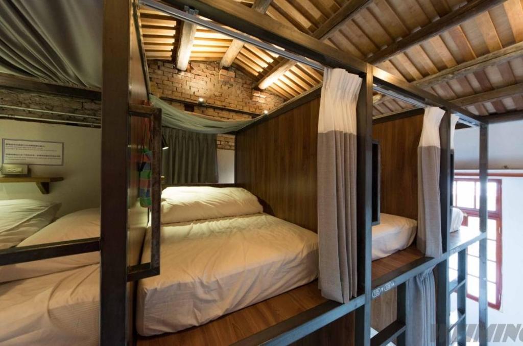 Postel nebo postele na pokoji v ubytování 158 Hostel
