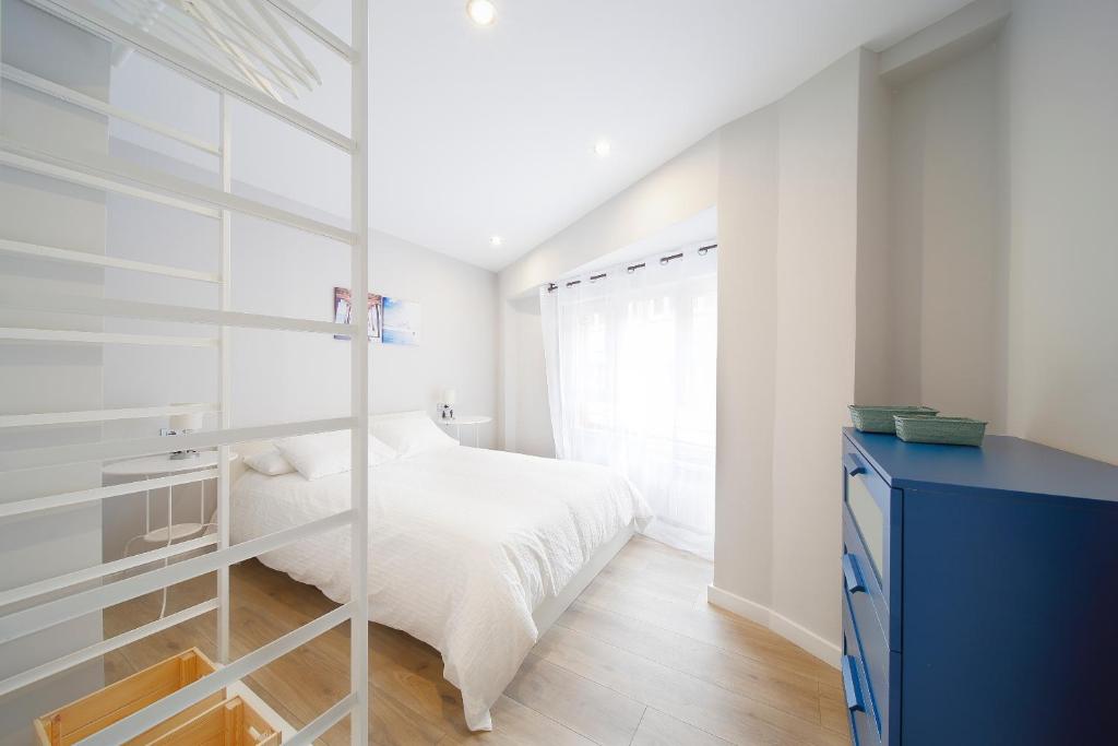 A bed or beds in a room at Centro-Nautico III
