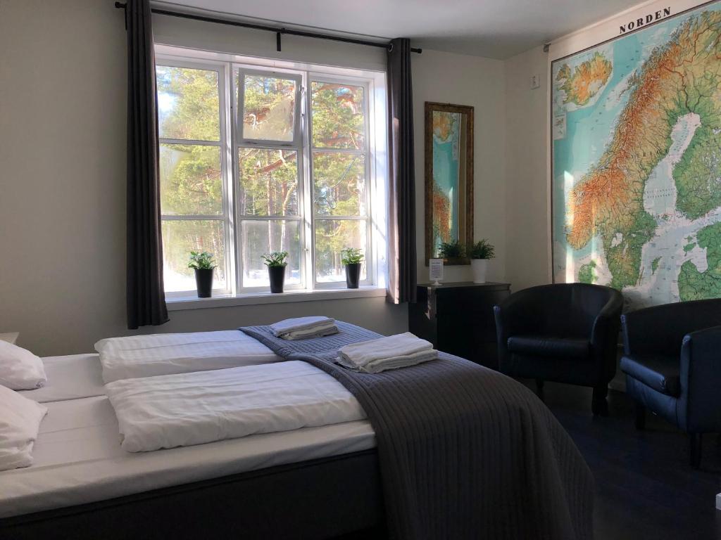 Postel nebo postele na pokoji v ubytování Hedenstugan B&B Hotel