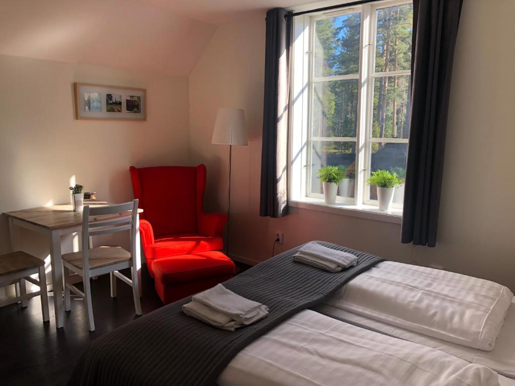 Postel nebo postele na pokoji v ubytování Hedenstugan B&B Hotel
