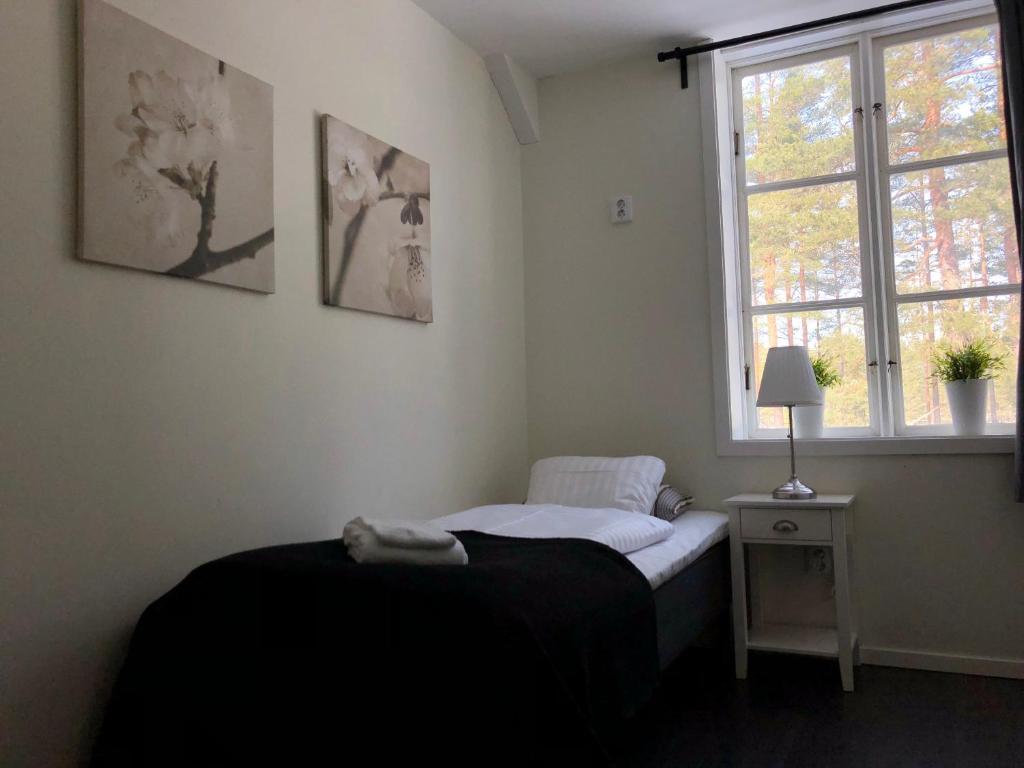 Postel nebo postele na pokoji v ubytování Hedenstugan B&B Hotel