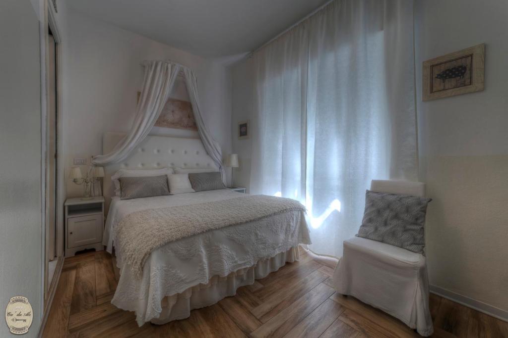 Postel nebo postele na pokoji v ubytování Ca' Du Ale