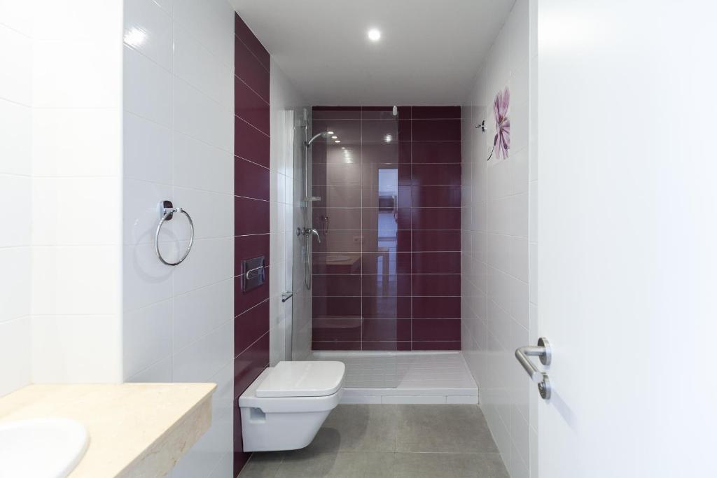 Koupelna v ubytování UHC Novelty Apartments