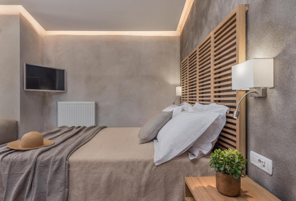 Postel nebo postele na pokoji v ubytování Phoenix Hotel