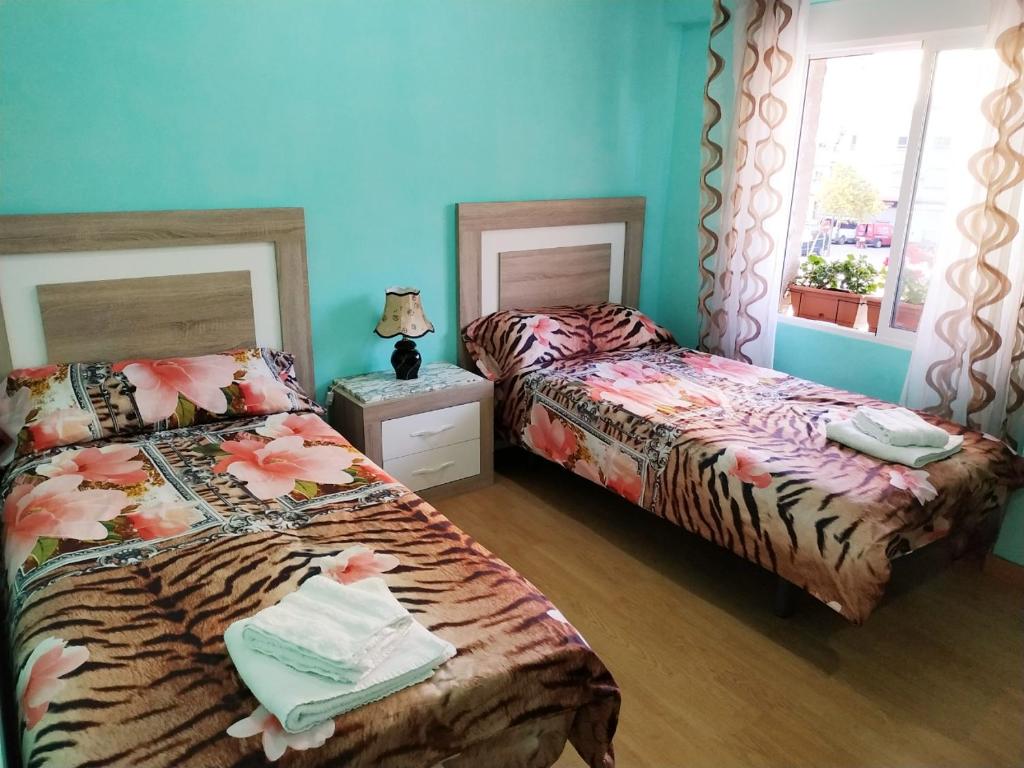 Posteľ alebo postele v izbe v ubytovaní Apartamento Turistico en Valencia