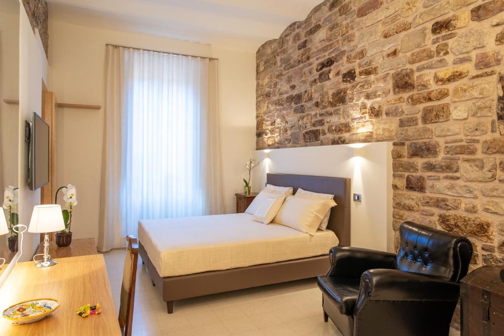 Postel nebo postele na pokoji v ubytování Portica10 Assisi