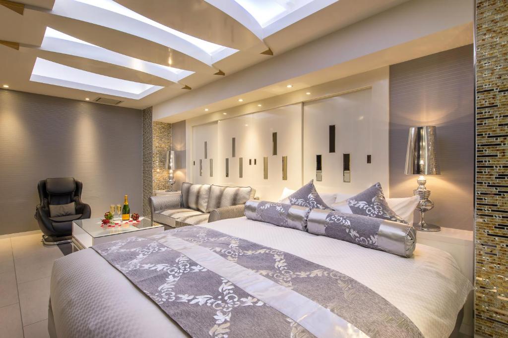 Postel nebo postele na pokoji v ubytování HOTEL Dior7