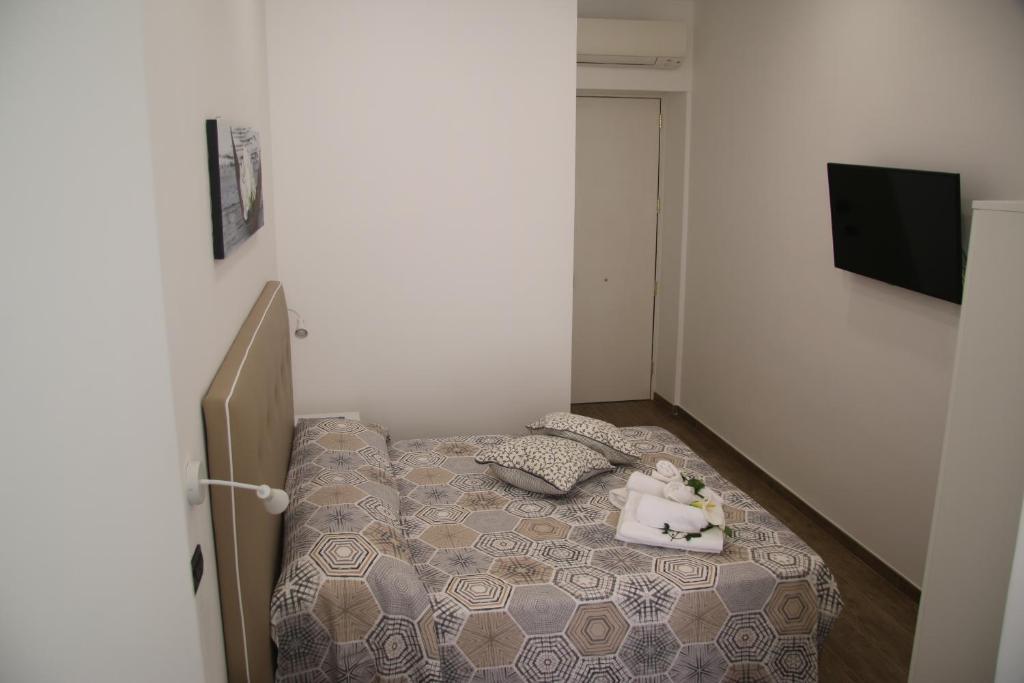 Postel nebo postele na pokoji v ubytování Da Ninì