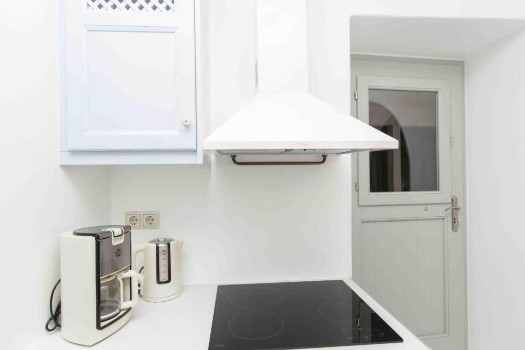 Kuchyň nebo kuchyňský kout v ubytování Aegean White Home