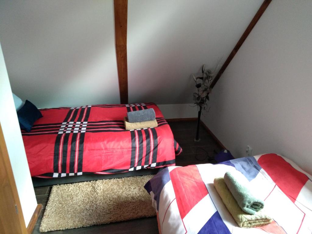 Postel nebo postele na pokoji v ubytování Dolina Rosy