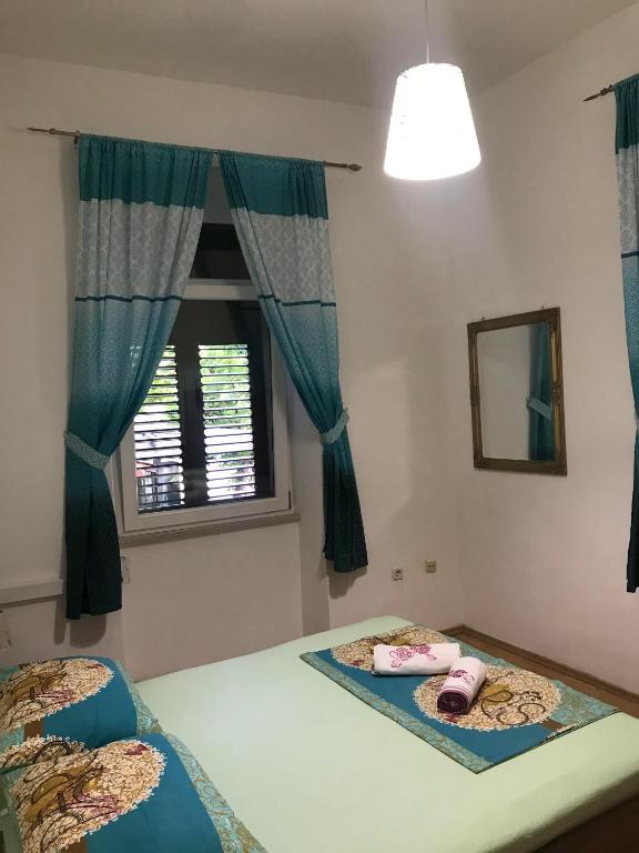 Posteľ alebo postele v izbe v ubytovaní Epicenter Apartments Split
