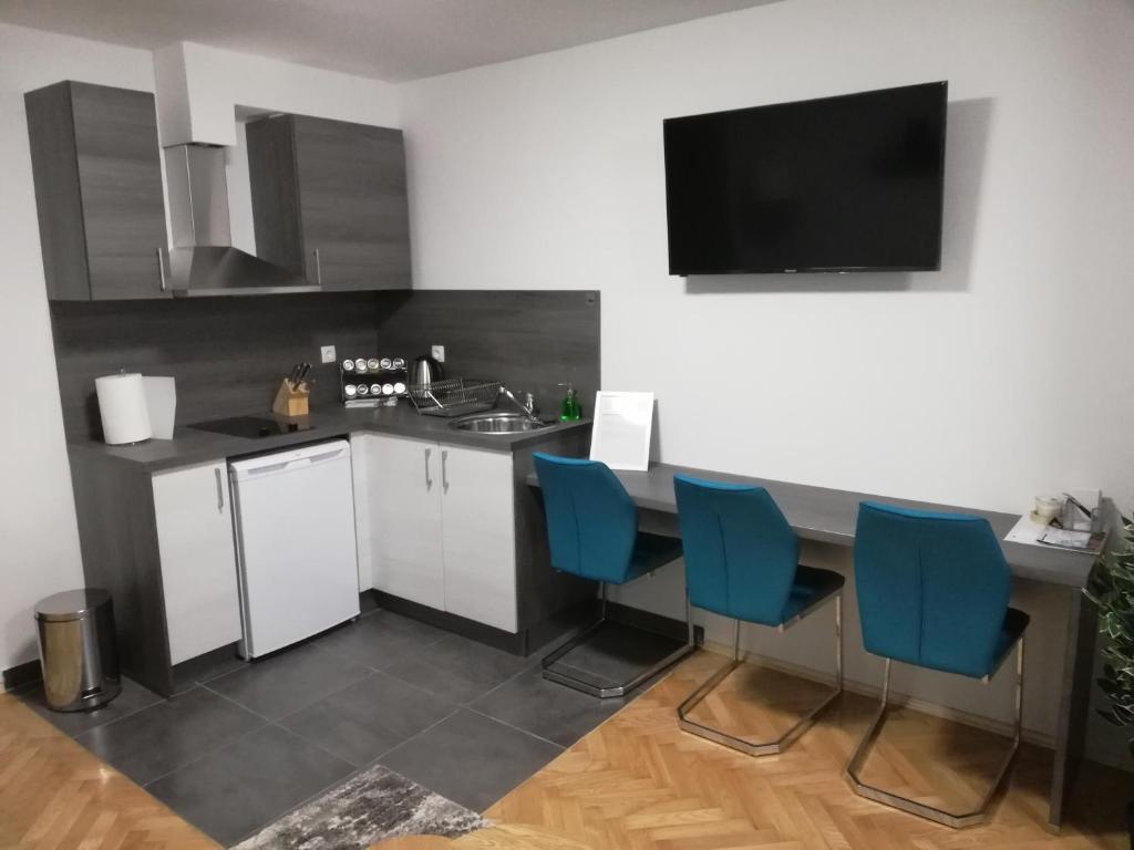 Kuchyňa alebo kuchynka v ubytovaní Apartments Ali
