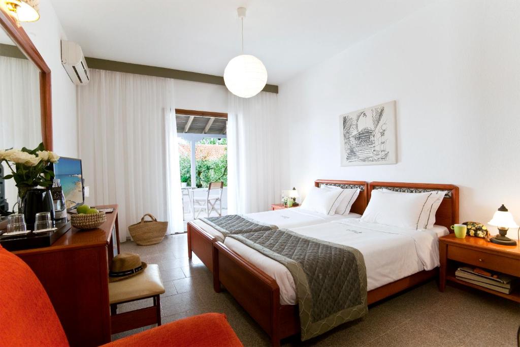 Кровать или кровати в номере Acrotel Elea Beach