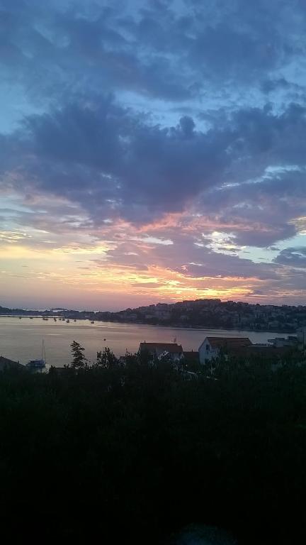 a sunset over a large body of water at Varaždinci in Rogoznica