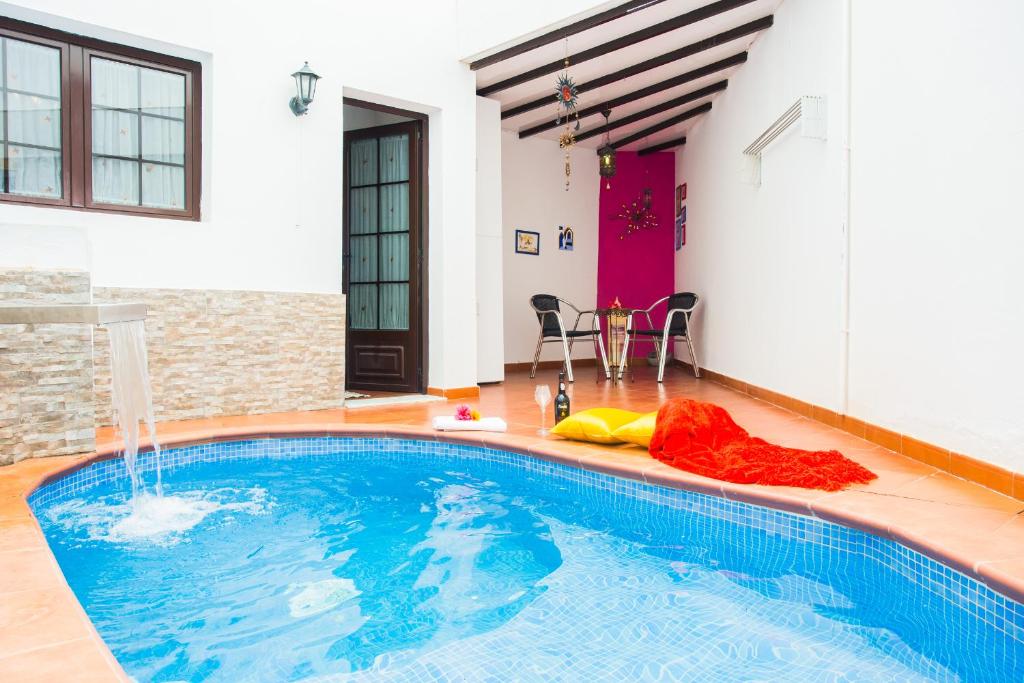 The swimming pool at or close to Casa Lola