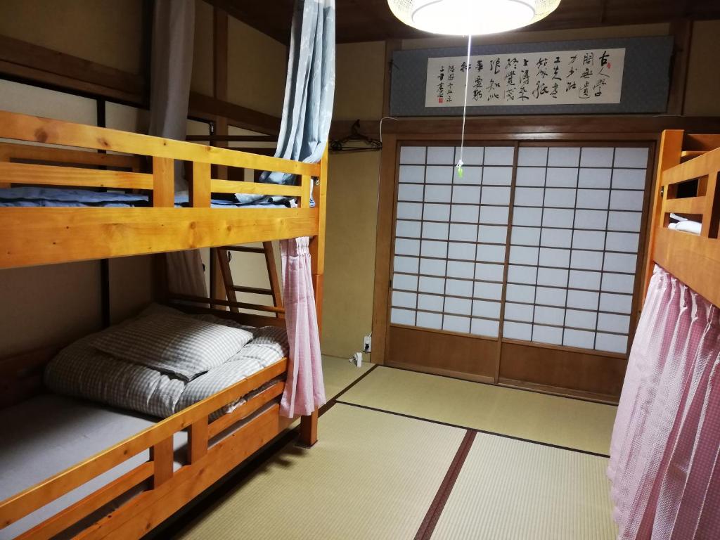Izu Hokkawa Seaside Guesthouse 伊豆北川の家 - Bed In 4-Bed Mixed Dormitory Room