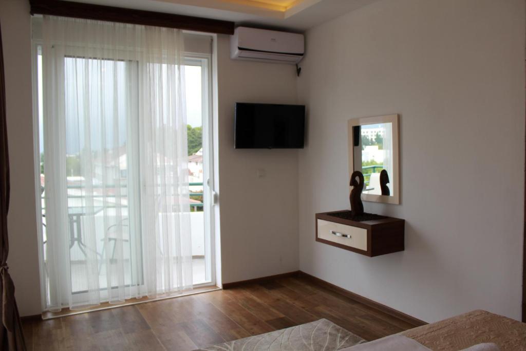 TV a/nebo společenská místnost v ubytování B&B Lovac