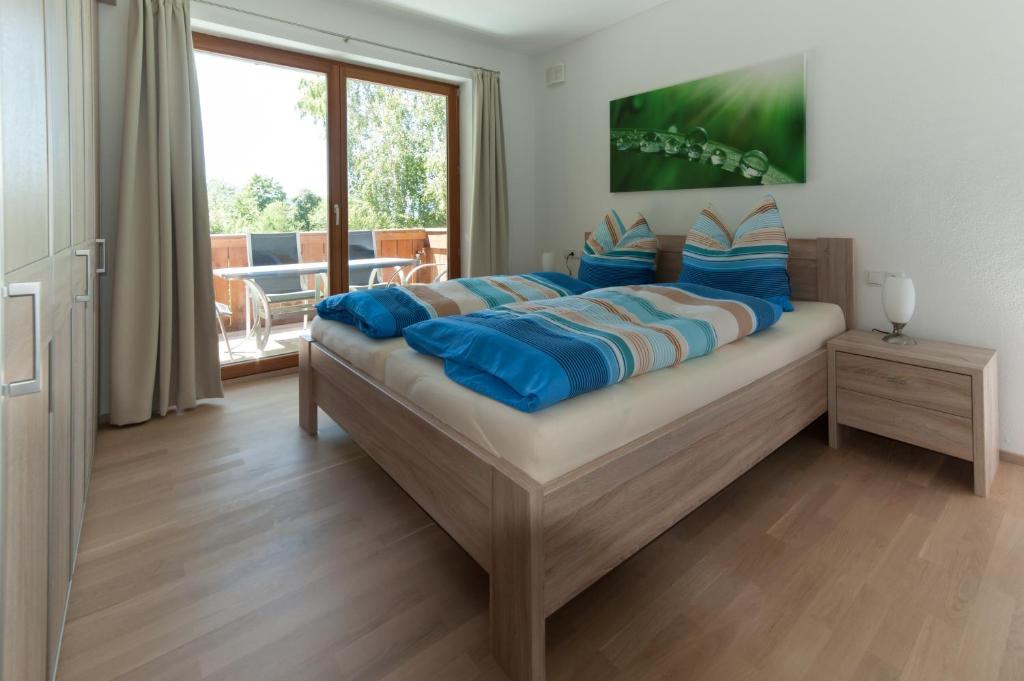 Postel nebo postele na pokoji v ubytování Haus Widmoos