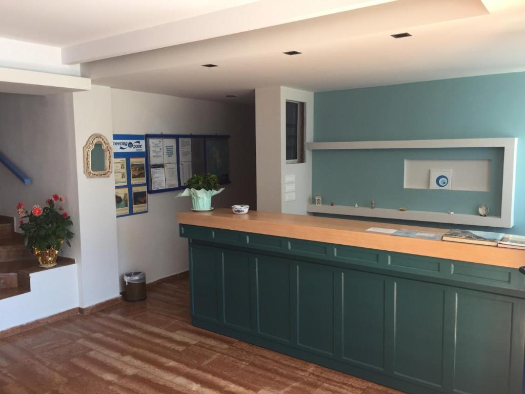 Kuchyň nebo kuchyňský kout v ubytování Knossos Hotel