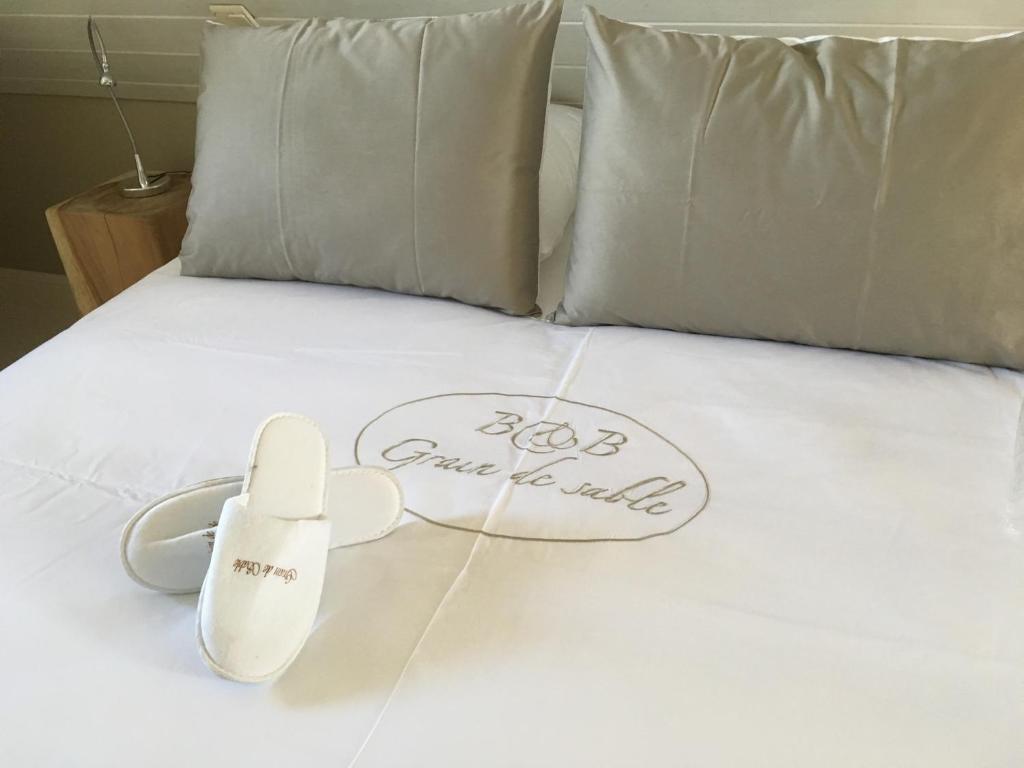 Postel nebo postele na pokoji v ubytování B&B Grain de Sable