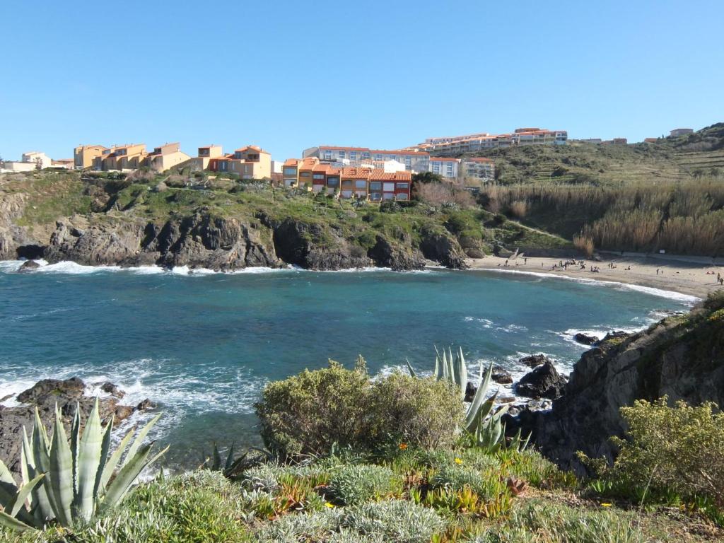 a view of the beach from the cliffs at Apartment Les Roches Bleues-1 by Interhome in Collioure