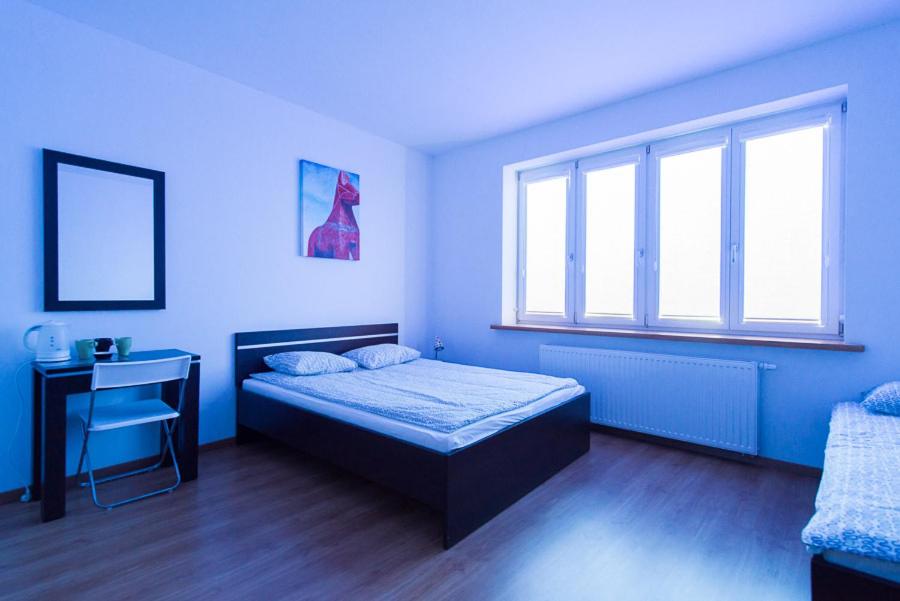 Postel nebo postele na pokoji v ubytování Lux Hostel - z prywatnymi łazienkami