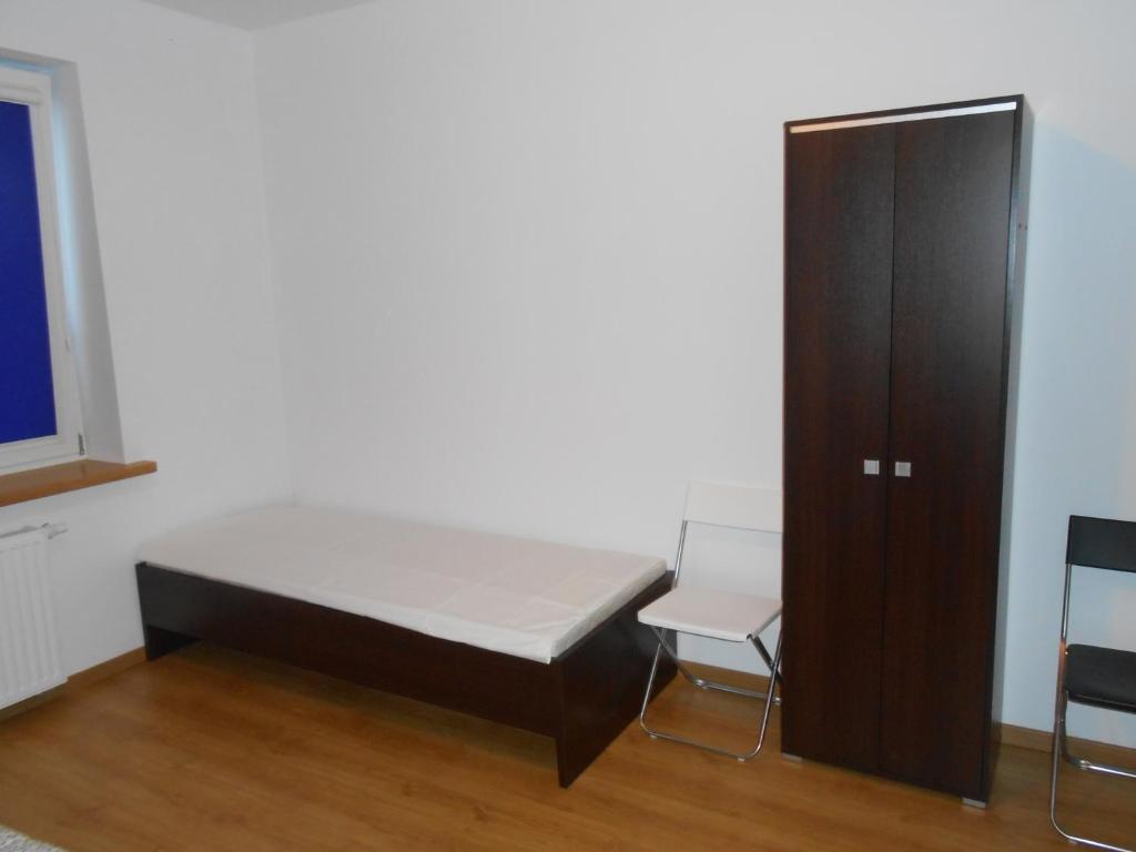 Postel nebo postele na pokoji v ubytování Lux Hostel - z prywatnymi łazienkami