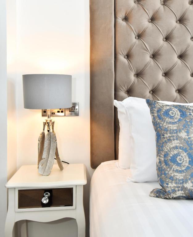 Posteľ alebo postele v izbe v ubytovaní The Lane - Boutique Residence