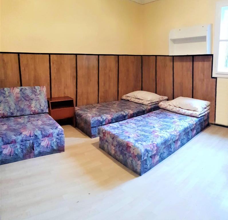 Postel nebo postele na pokoji v ubytování Muskátli Vendégház
