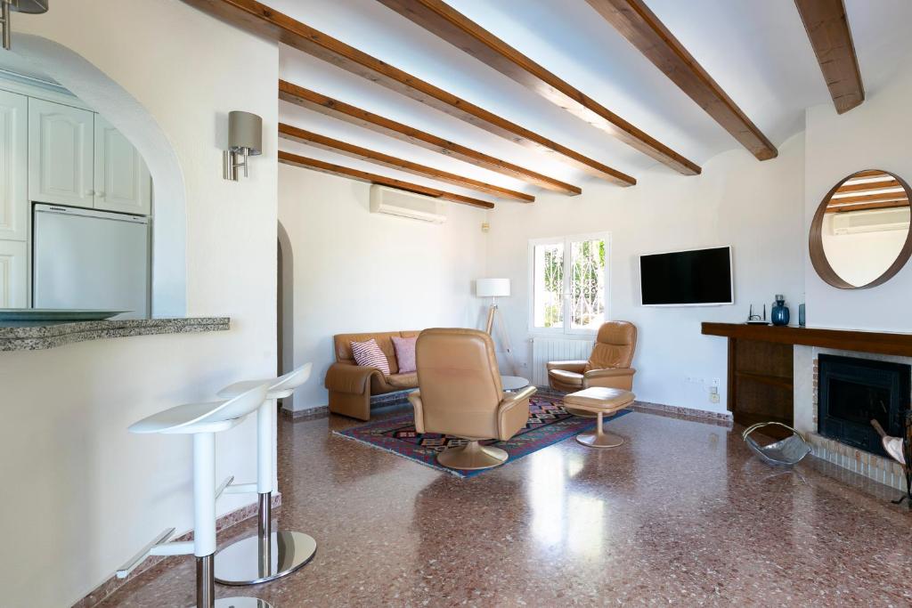 TV a/nebo společenská místnost v ubytování Villa Montgo Denia