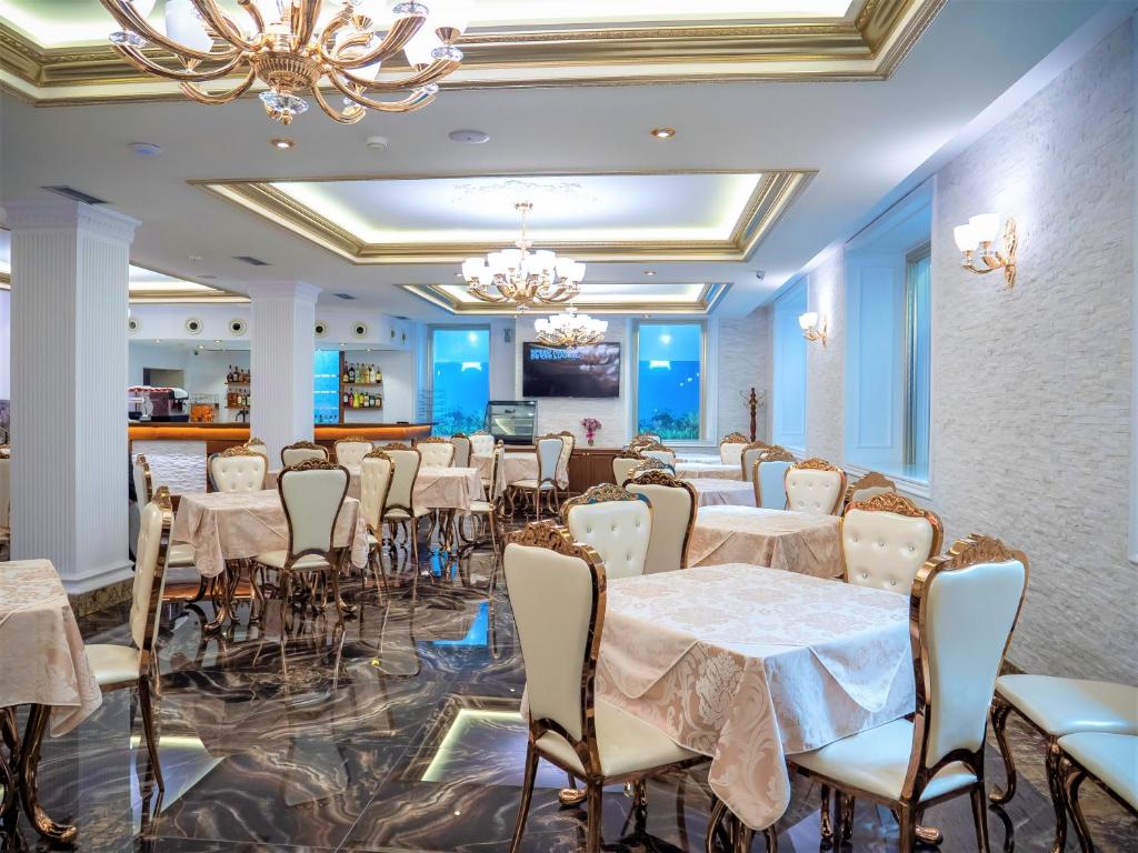 TV a/nebo společenská místnost v ubytování Hotel Boka