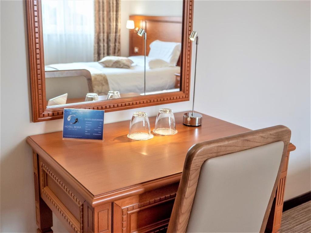 Postel nebo postele na pokoji v ubytování Hotel Boka