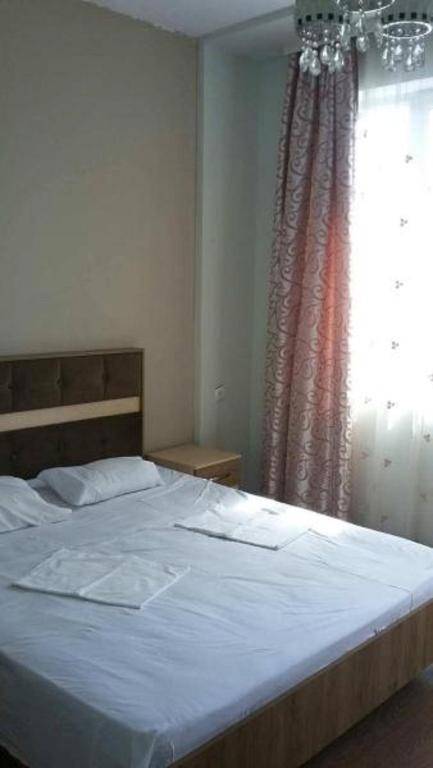 Postel nebo postele na pokoji v ubytování Homestay Izolda