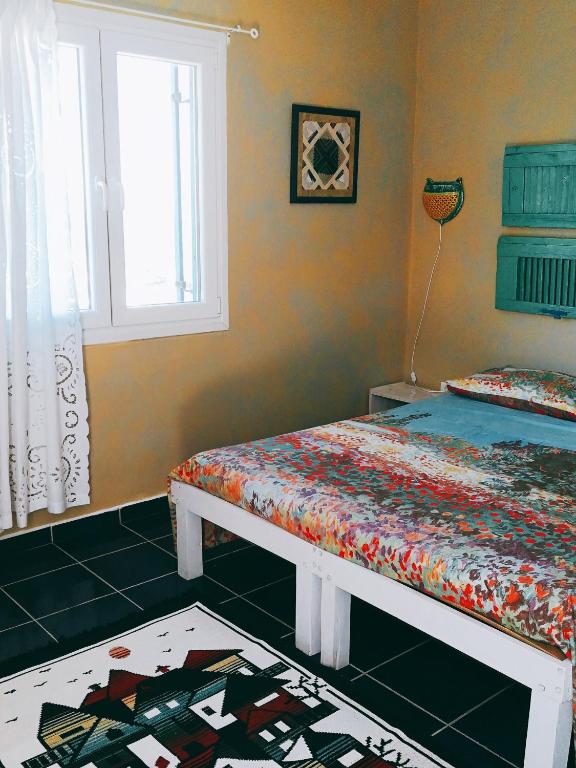 Postel nebo postele na pokoji v ubytování Il Canto delle Cicale