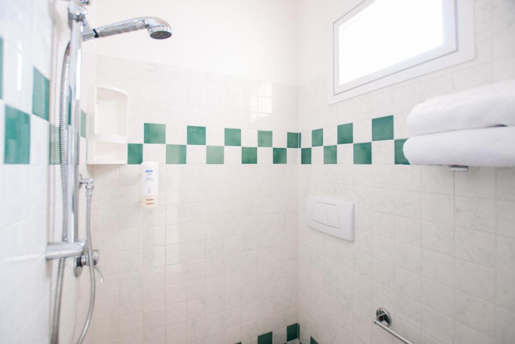 Koupelna v ubytování Hotel Fra I Pini