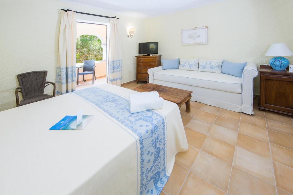 Postel nebo postele na pokoji v ubytování Hotel Colonna San Marco