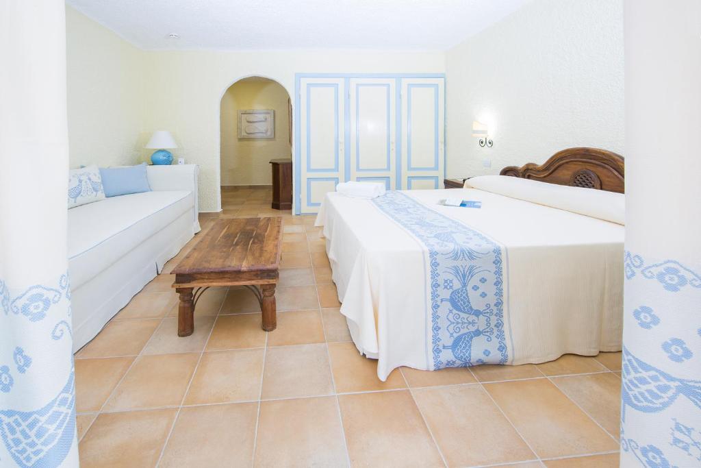 Postel nebo postele na pokoji v ubytování Hotel Colonna San Marco