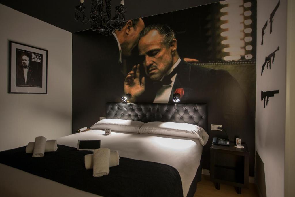 
Een bed of bedden in een kamer bij Casual del Cine Valencia
