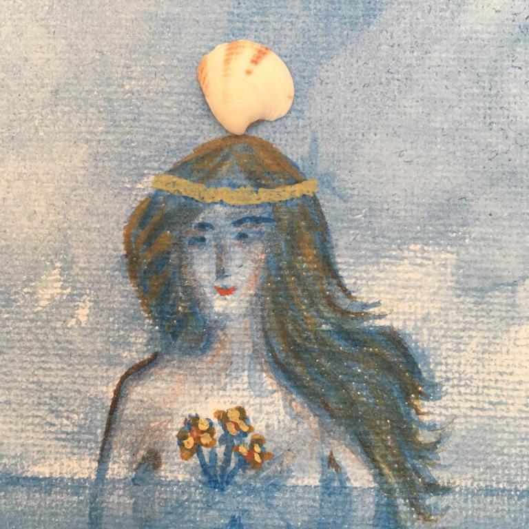a painting of a woman with a ball on top of her head at Dionisos Blue in Paralia Dionysiou