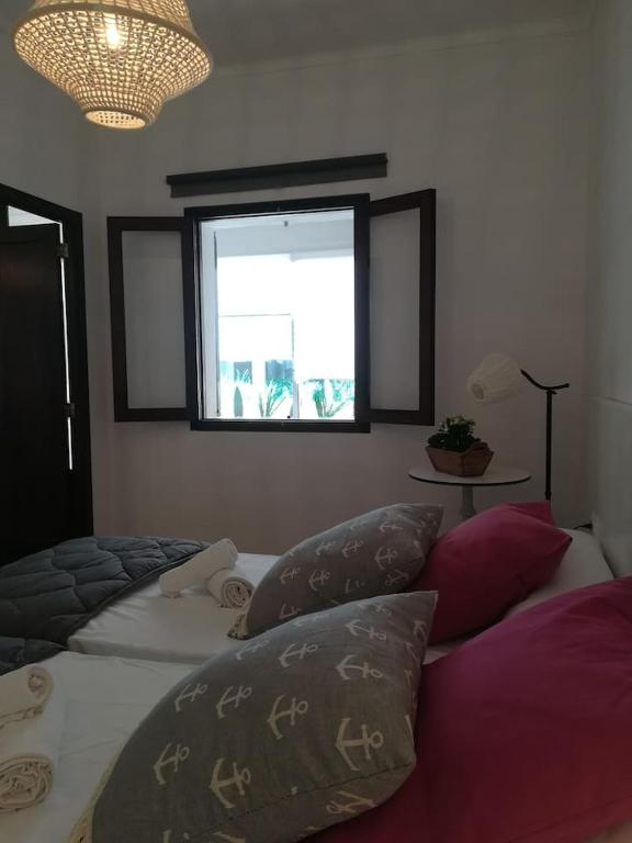 Postel nebo postele na pokoji v ubytování CASA 2 PINS
