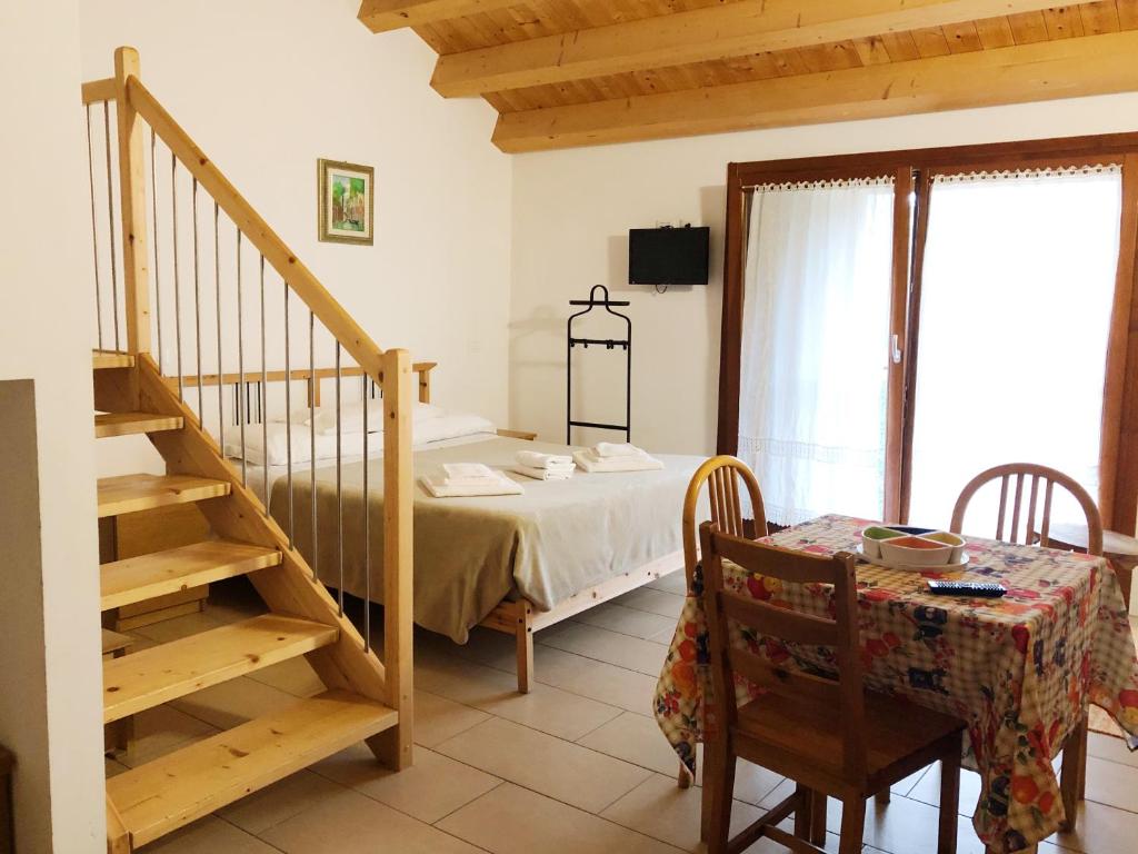 Postel nebo postele na pokoji v ubytování Agriturismo Corte Del Brenta