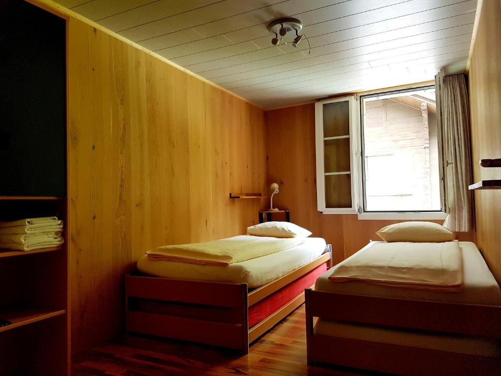 Postel nebo postele na pokoji v ubytování Angie's Apartments
